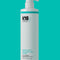 K18 hair Jumbo Detox shampoo bottle on a teal background. 