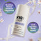 K18 hair mask bottle with floral and nature-themed design on a purple background