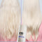 Before and after comparison of hair using K18 product on a blue and green gradient background.