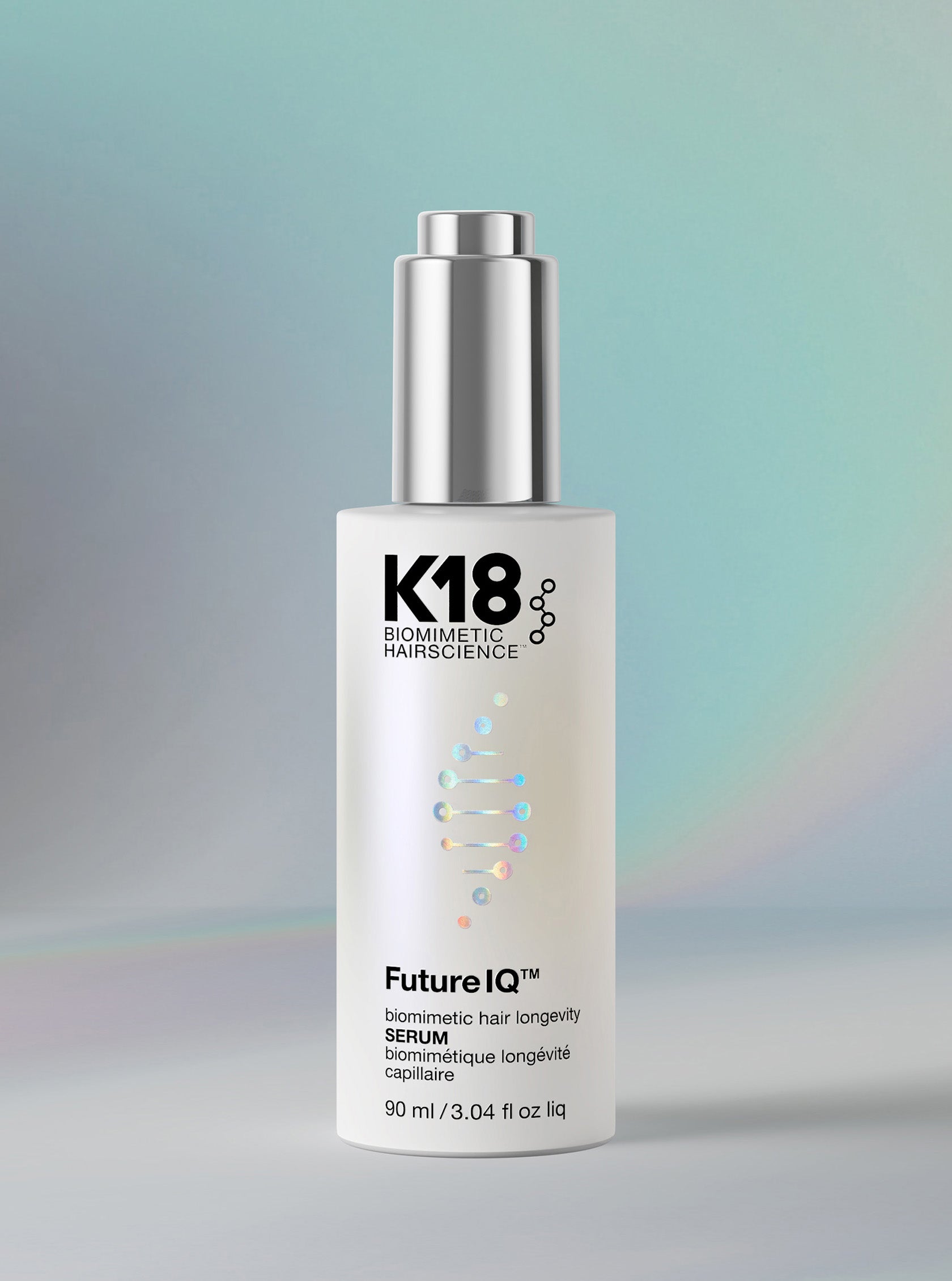 K18 biomimetic hair science serum bottle on a gradient background