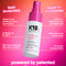 K18 heat protectant and leave-in conditioner bottle with text on a pink and orange gradient background