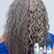 Curly grey hair before and after using k18 hair products. 
